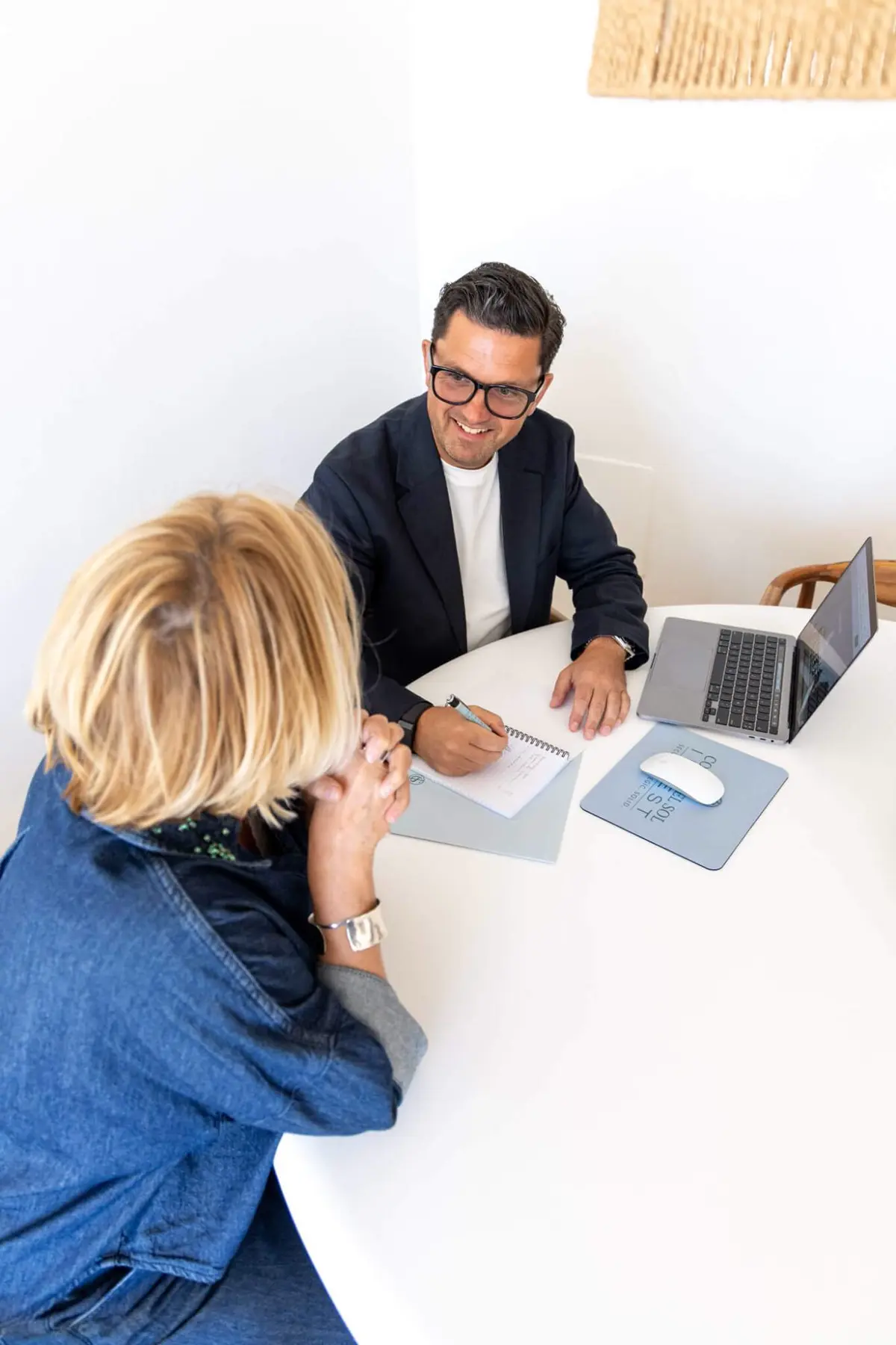 Brand shoot: a client meeting with branded stationery